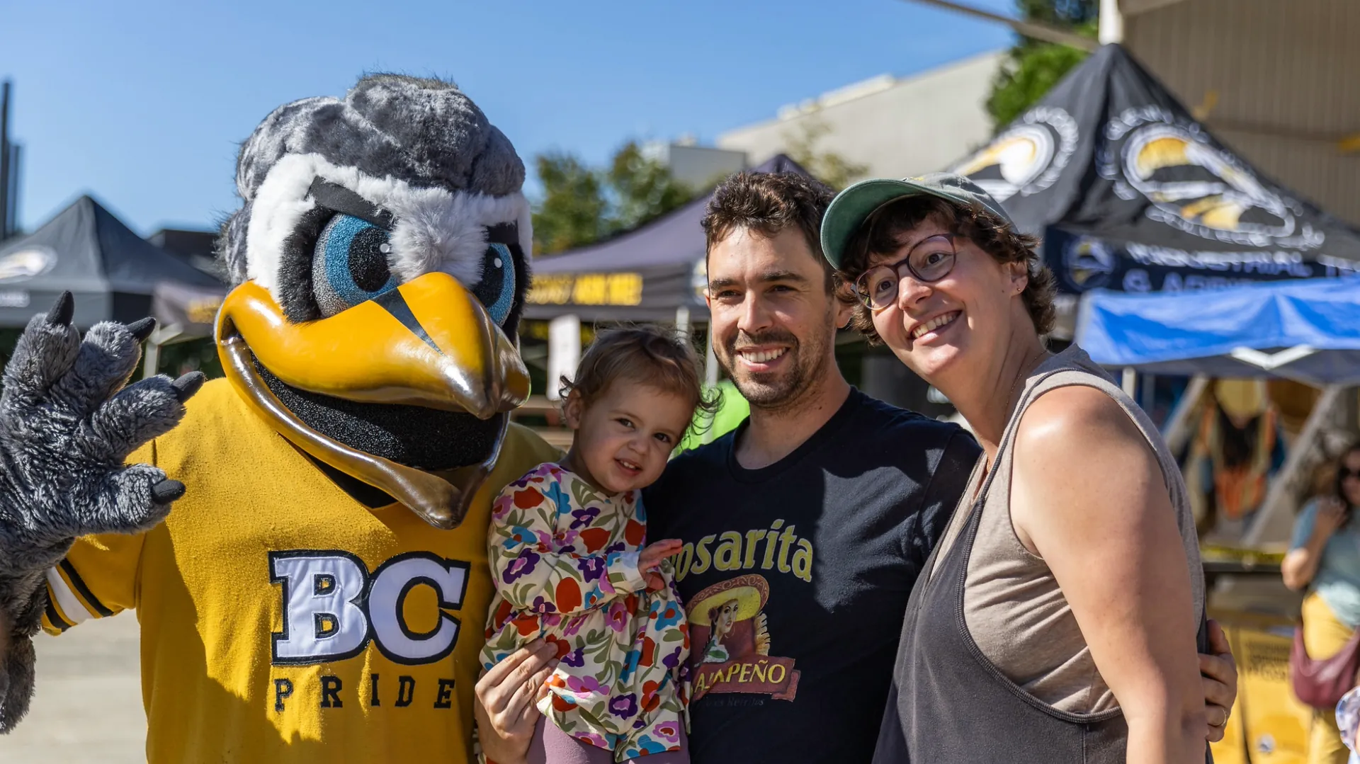 Butte College Dash mascot poses with event patrons
