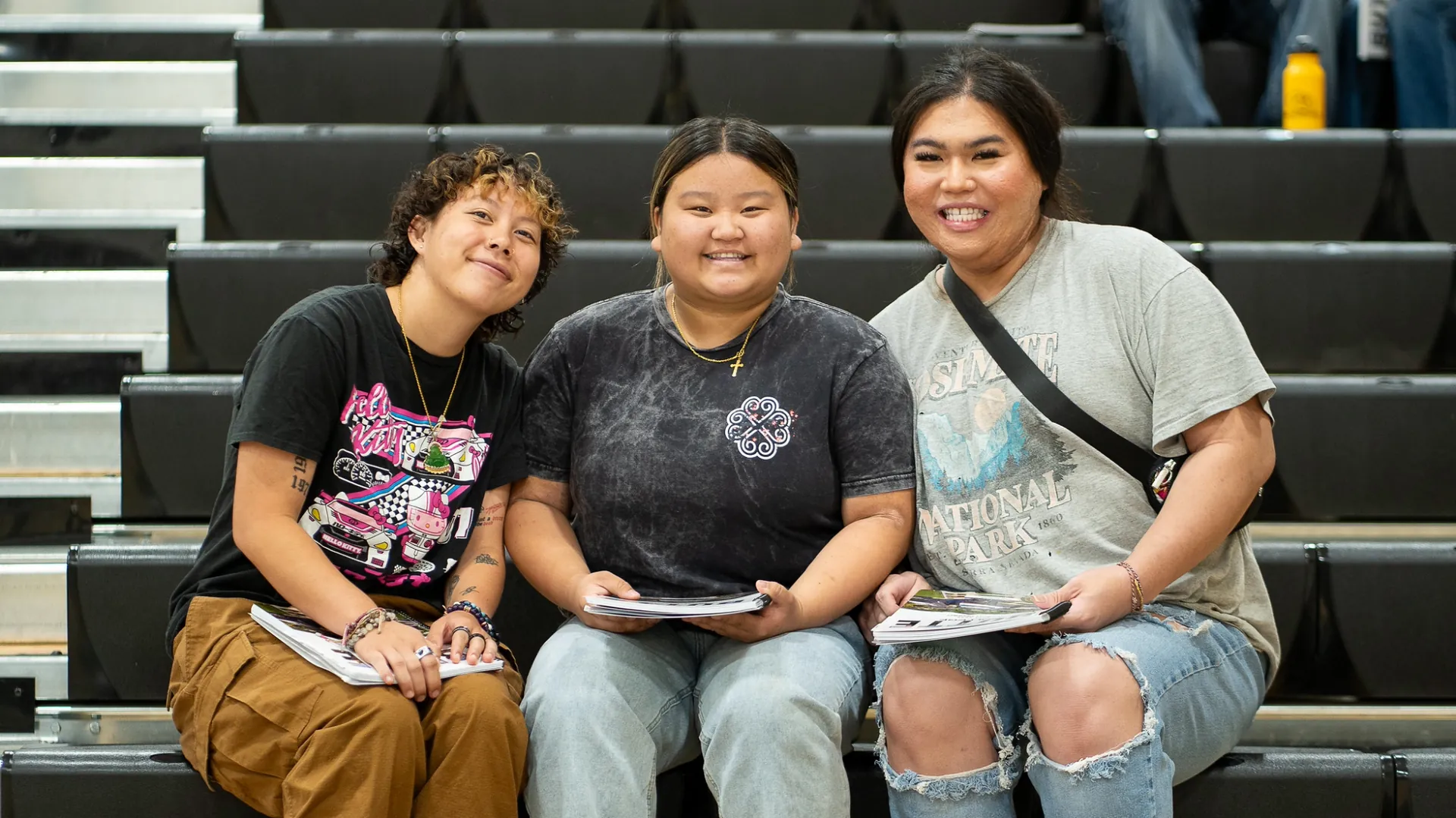 Three Butte College Students gather in auditorium