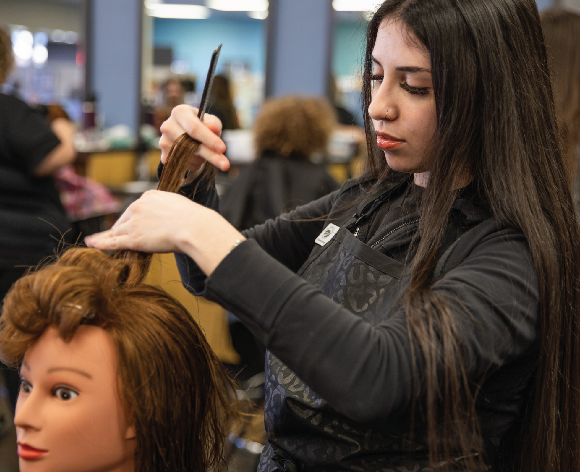 Butte College Cosmetology Student Cutting And Styling Hair