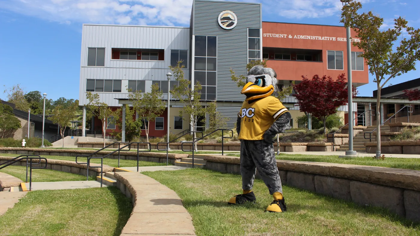 Dash Mascot in front of sas
