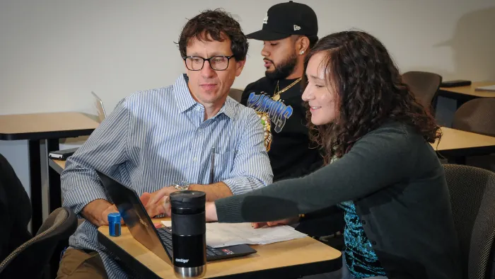 Butte College Employees instructor helping a student