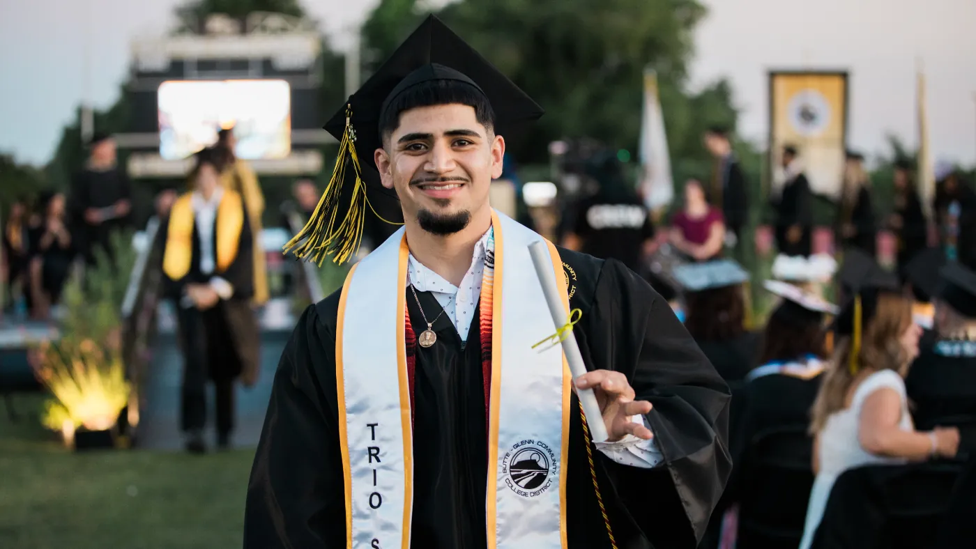 Butte College Graduation trio graduate with diploma