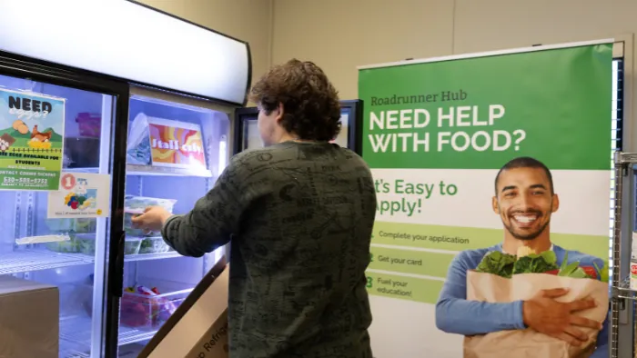 Butte College Roadrunner Hub student using the roadrunner hub for fresh produce