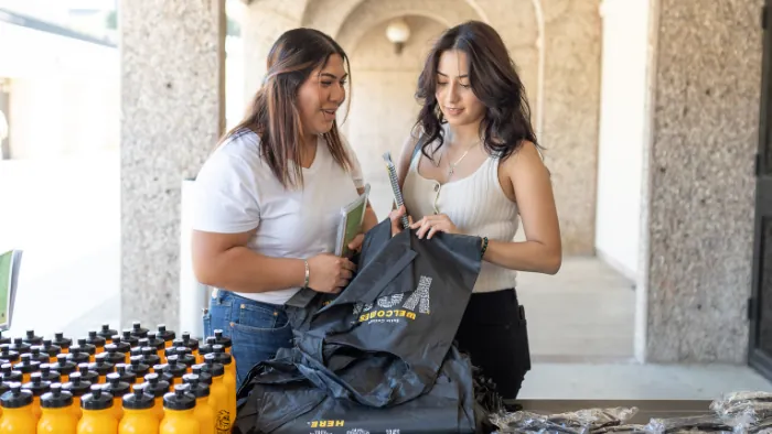 Butte College Roadrunner rush students look at butte college swag