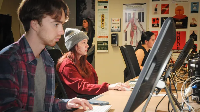 Butte College graphic design students working on projects