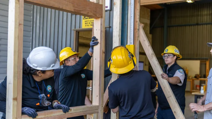 Butte College Training Place construction boot camp attendees build a frame