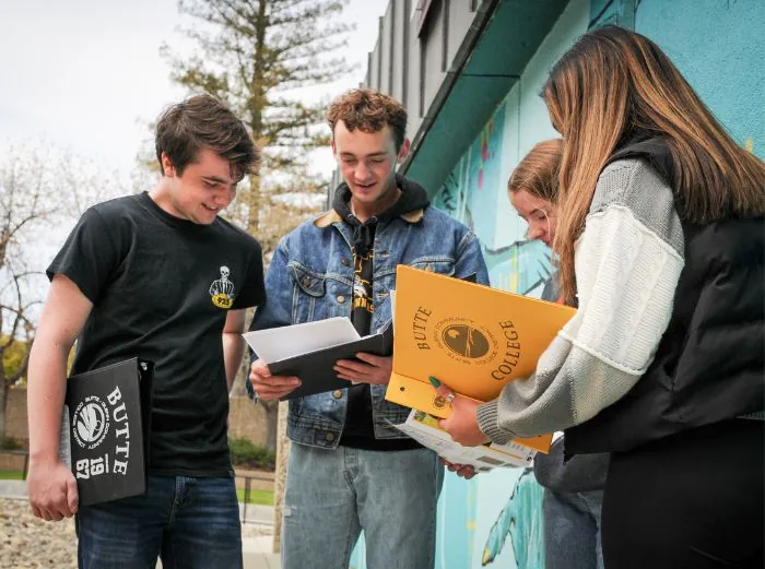 Butte College Students reading and reviewing notes together