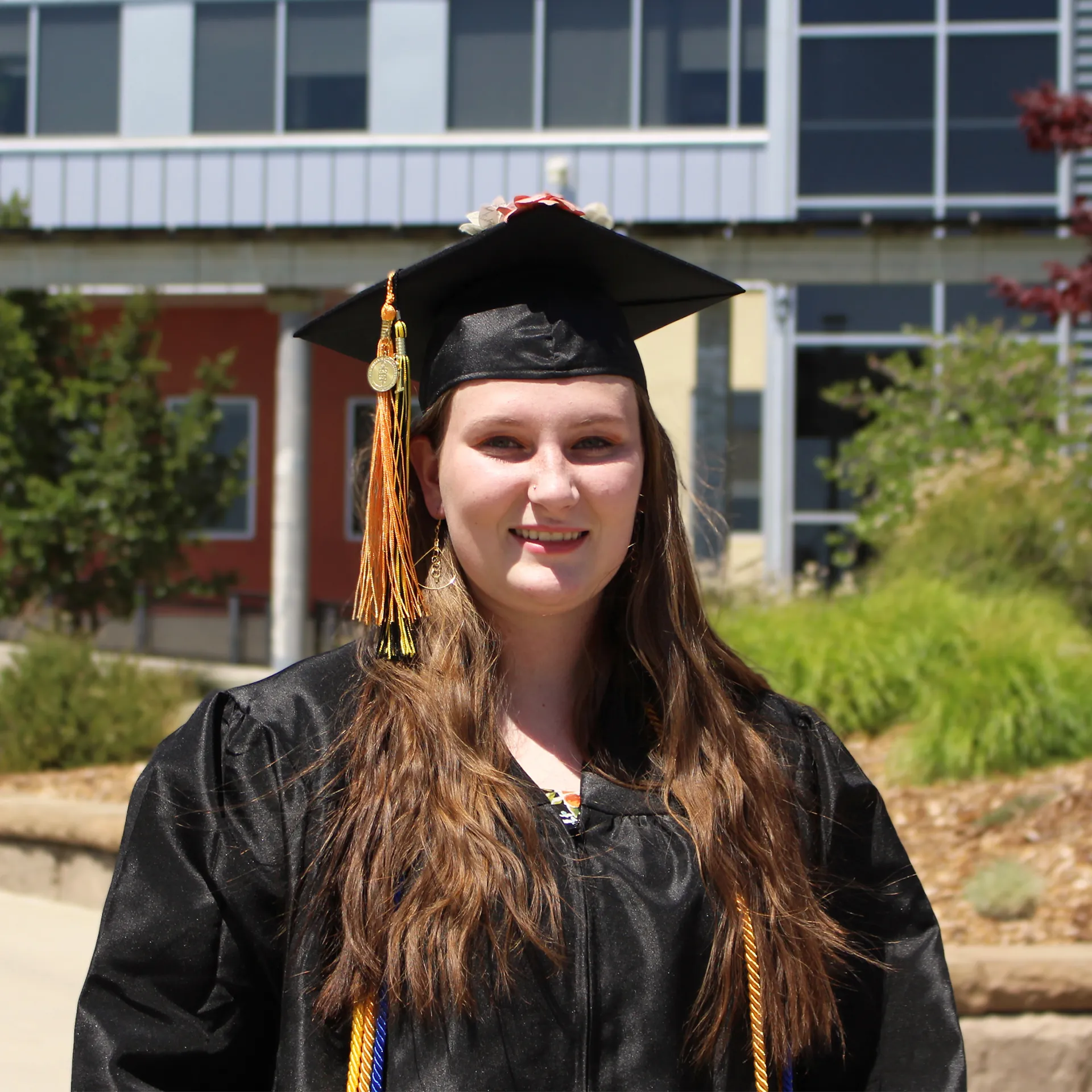 Butte College Graduate shows off her cap and gown