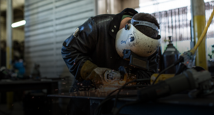 A Butte College student welding works on a project.