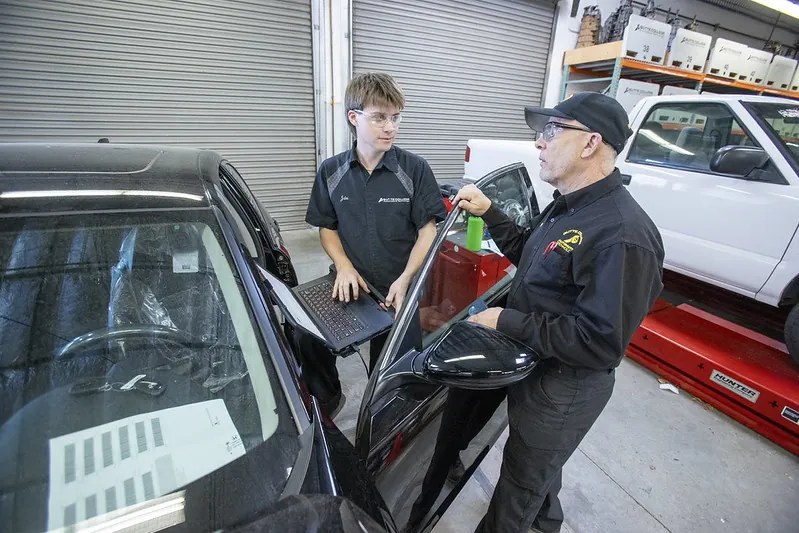 Butte College auto shop instructor and student