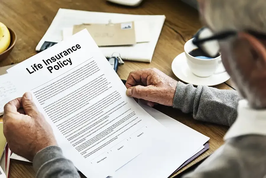 Butte College Foundation members review life insurance policy