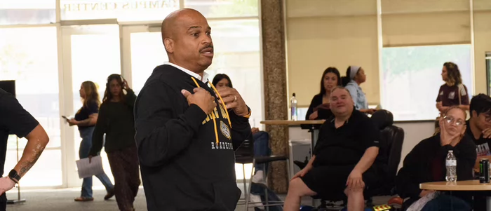 VPSS Robinson speaks to students at the Campus Center.