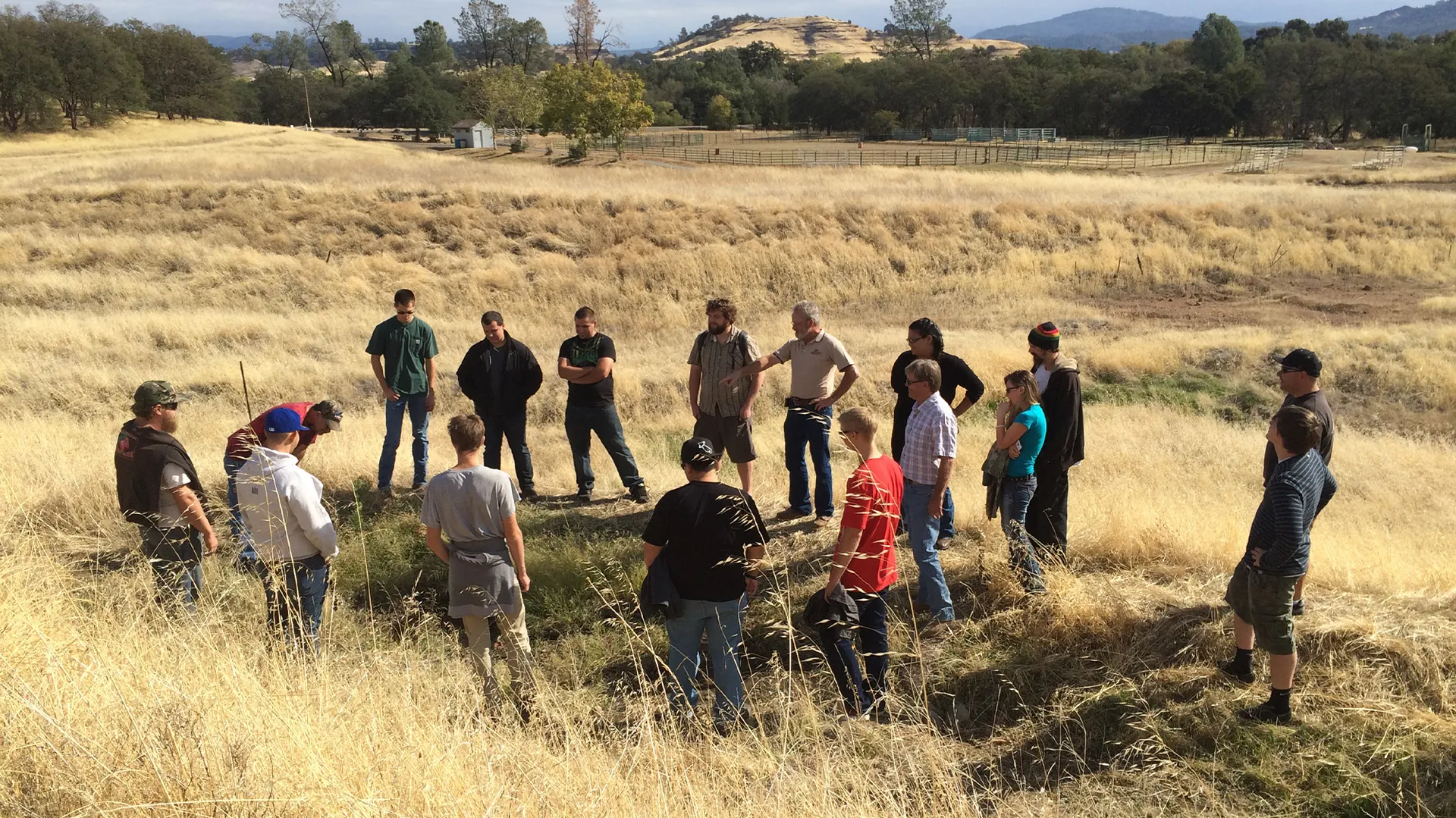 Butte College Students gather on hillside at wildlife refuge