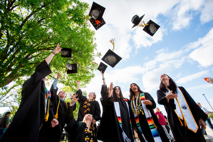 grads-throw-caps-in-excitement