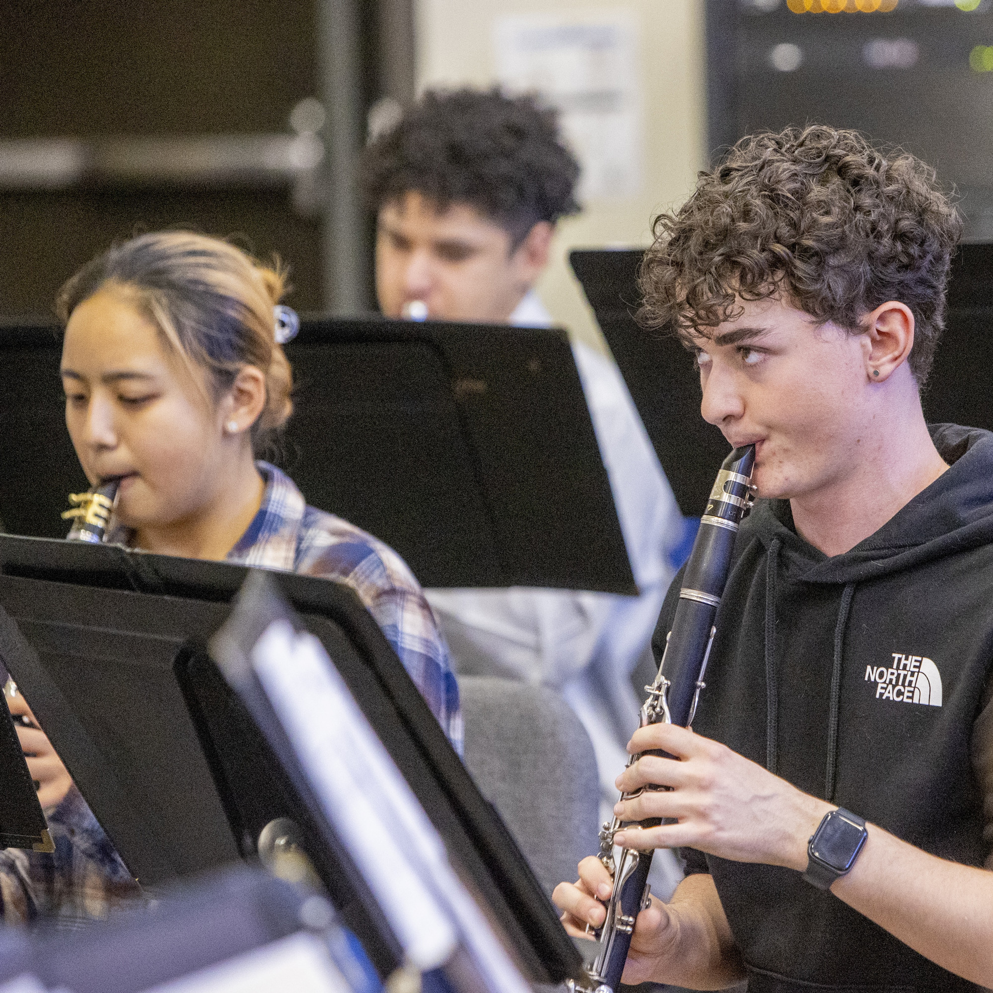 students playing clarinet in band