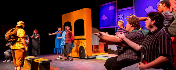 students performing in theater production