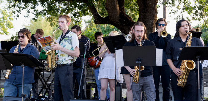 group of students in small music ensemble performing