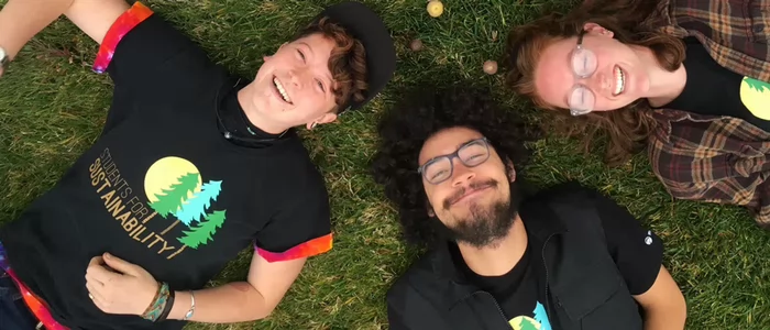 students-for-sustainability-laughing-while-laying-on-grass