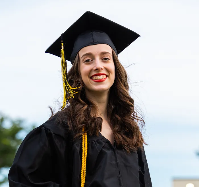 Butte College Graduate smiles at commencement ceremony