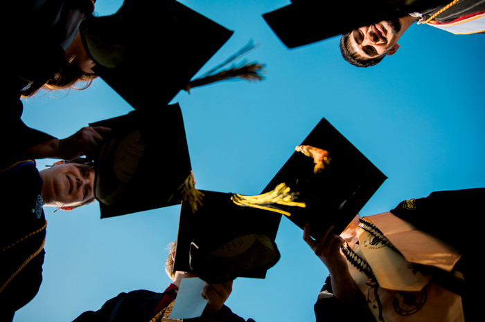 grads-prepare-to-throw-caps