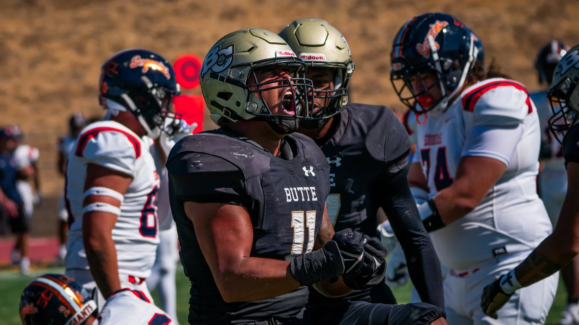 Butte College Football player celebrates on field