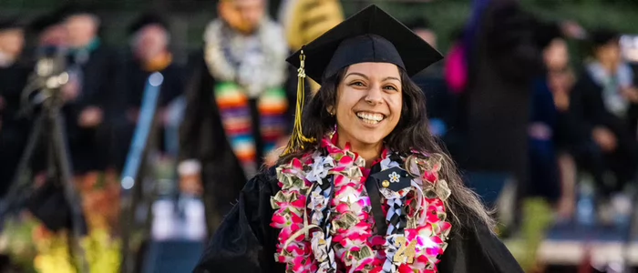 female-phi-theta-kappa-graduate-pink-lei.