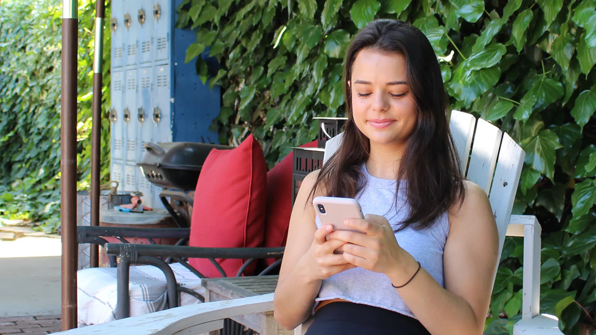 Butte College Student checks mybc account from mobile phone on campus