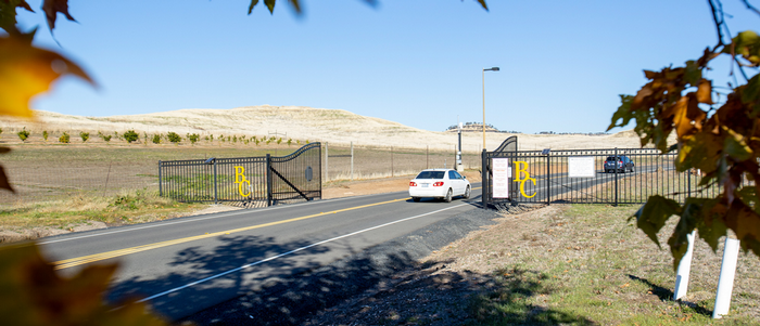A car drives past the Butte College gates.