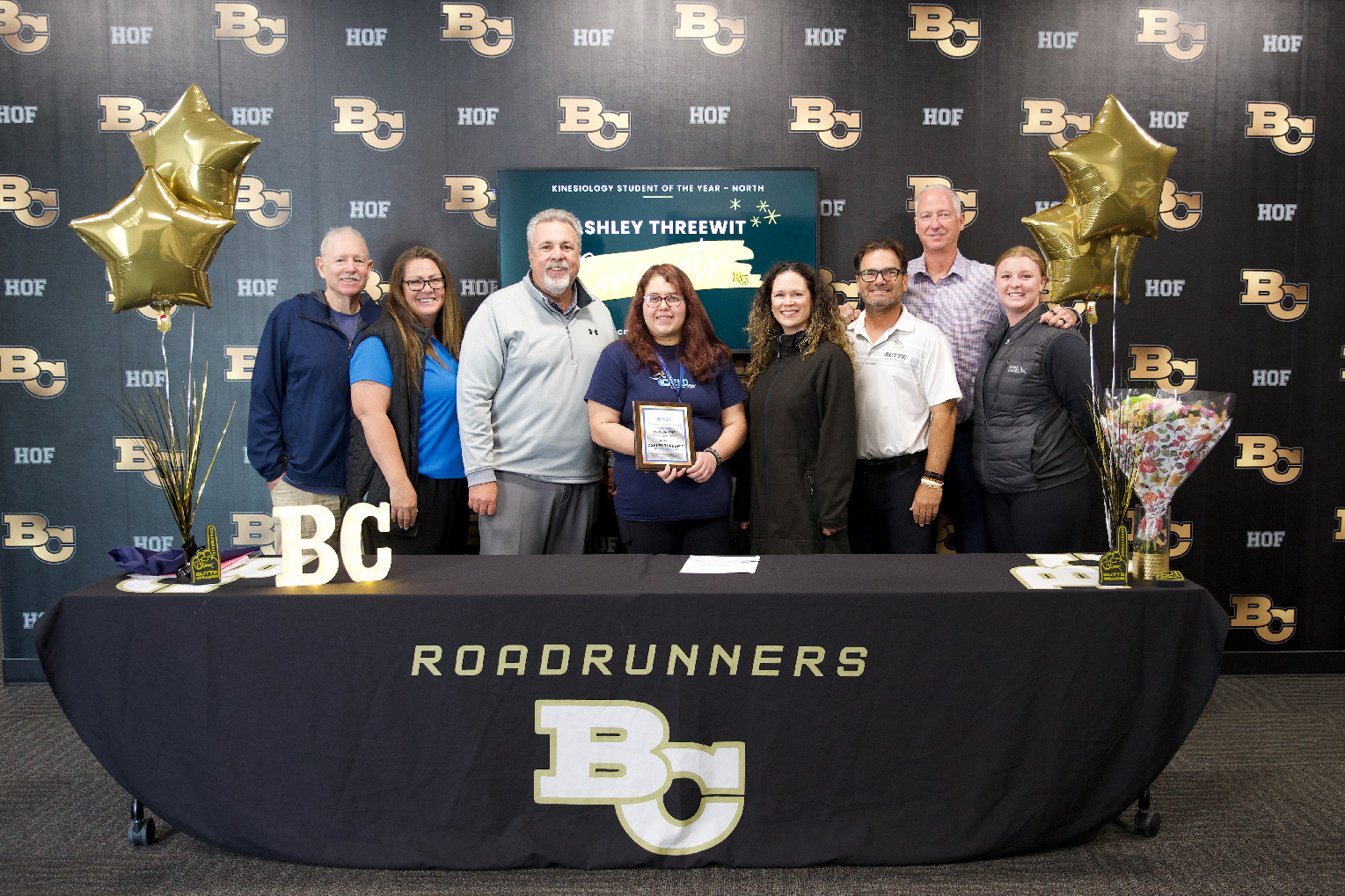Ashley Threewit and her teachers at the award ceremony.