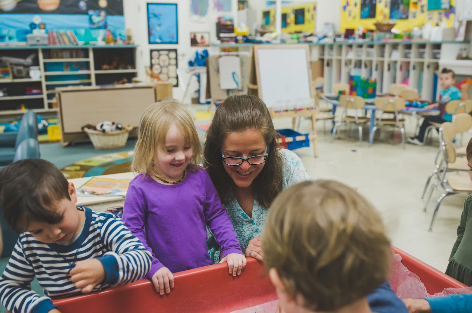 Butte College Student resources basic needs childcare center worker plays with children