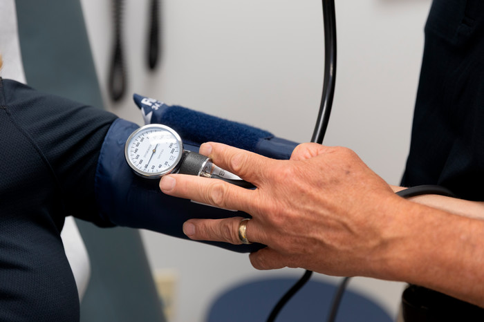 person-gets-blood-pressure-taken
