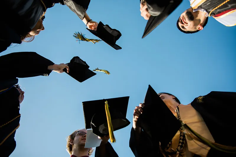 Butte College Students throw graduation caps at commencement ceremony