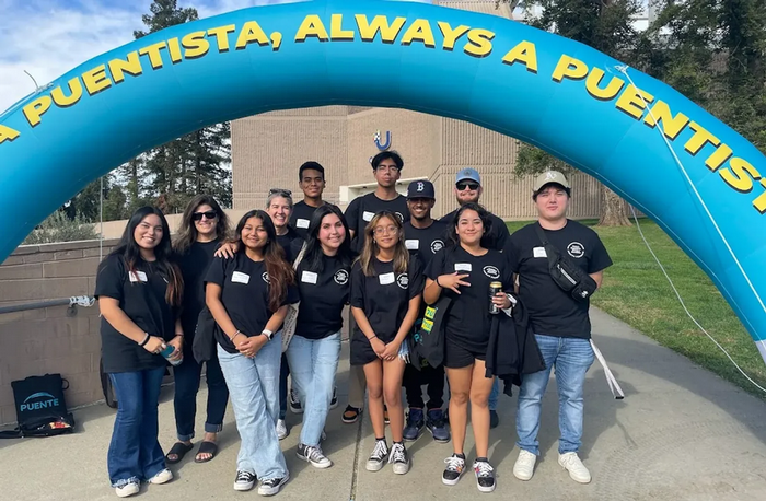 puentistas-students-pose-for-photo-at-event